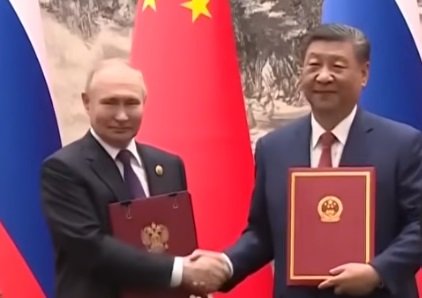 Relações Diplomáticas Fortalecidas: Putin e Xi Jinping Selam Parceria Estratégica em Visita O... 1 Presidente da Rússia